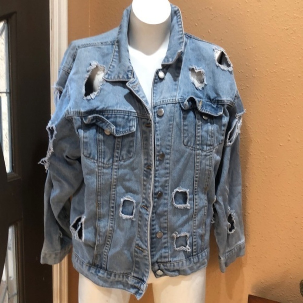 Thirty 6 point 5 blue destroyed denim jacket
